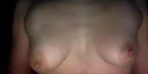 Amateur fit girl plays with perfect boobs