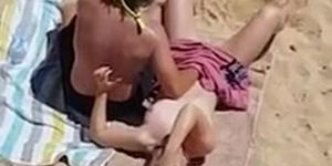 Lesbians playing on the beach