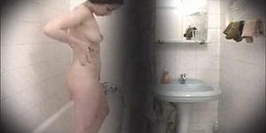 Hidden cam in bathroom - pretty brunette girl