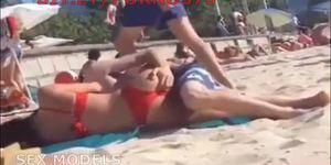 Husband fucks sexy wife on a public beach.