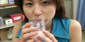 Girl collects cum in a beaker and gives a good show