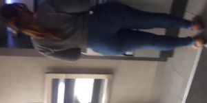 Candid big booty girl in pocketless blue jeans
