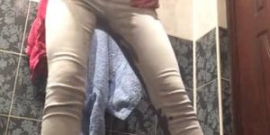 Eli Pisses & Baths in her Tight Grey Jeans with Pantyhose and Shoes