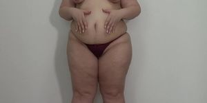 BBW shakes stuffed belly and big ass in panties. Fetish.