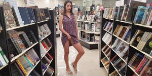 Woman in a Bookstore Shows her Pussy and Ass