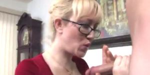 CFNM MILF with glasses jerking off cock - video 1