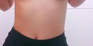 Sexy teen strips and reveals natural firm boobs