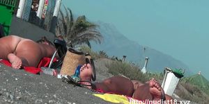 Real amateur nudist hotties with naked pussy at the beach