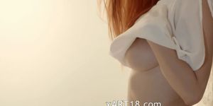 Unbeliveably breasty redhead teasing