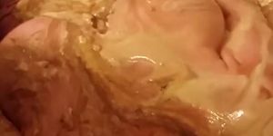 Messy fun in the tub , covered in custard, chocolate and cum