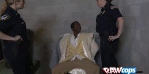 Black pimp gets into a warehouse to be fucked by two horny and wet milfs dressed as cops for a show