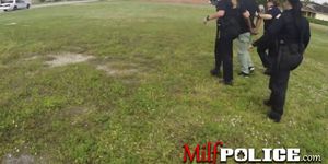 Milf cops chase criminal through green field onto rooftop