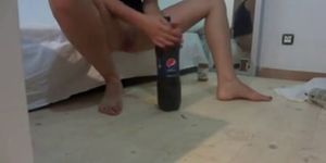 Teen fucks huge Pepsi bottle