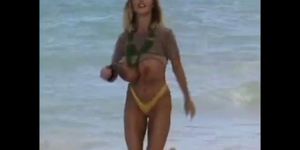 Big Tit Blonde Frolics on the Beach