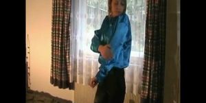 girl in shiny slippery satin blouse and satin pant