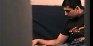 Zack unzips his pants and starts to massage his cock