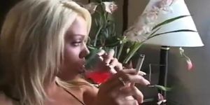 Incredible young blonde beauty smoking sexy