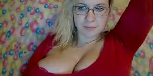 Busty takes her tits out for the webcam - video 1