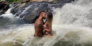 Outdoor waterfall makeout session
