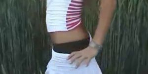 European Chick Toying In Grass - video 1