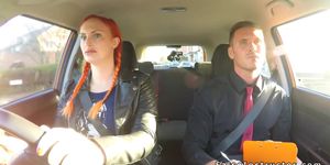 Pigtailed tattooed redhead bangs in car