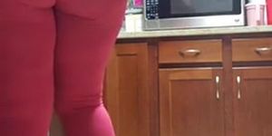 girl cleans stuff with huge ass showing
