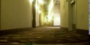 Teen babe masturbates in hotel hallway