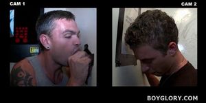 Nasty gay slurping cum out of gloryhole cock