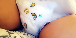 RED HEADED SHIRTLESS GIRL WETS HER DIAPER
