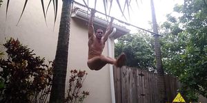 Man Soaking Wet & Naked in the Rain While Doing Pull-ups Eden Adonis