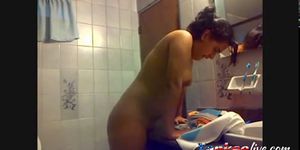 Tanned girl grindingnher pussy on the sink