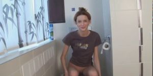 Extremely cute angular girl peeing - video 1