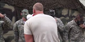 Military hunks in gas masks fuck and suck
