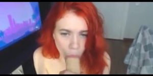 Hot Sexy Sucking a Great Dildo Babe Redhead at her WebCam
