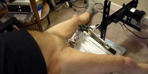 Fuck machine sounding my cock in chastity cage