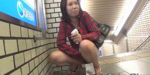 Horny Asian pissing in public