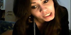 Brunette dildoing on webcam