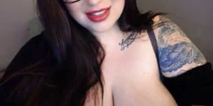Nerdy babe with some of thebiggest webcam boobs