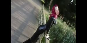 Latex Hijabi outside Walking