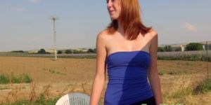 Redhead pulling amateur flashes her tits