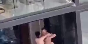 White Couple sex on balcony in broad daylight