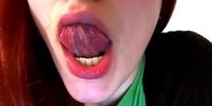 Sexy redhead teen shows what she can do with her tongue