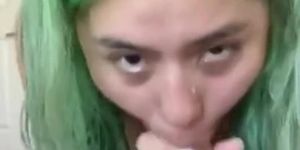 Green haired girl sucks cock for the first time