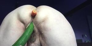 Slutty granny using cumcumber  in hairy pussy and caarrot in ass