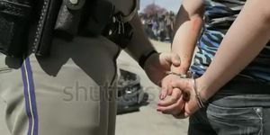 Tight Handcuffing of arrested teen girl