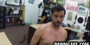 Horny stud sucking on two cocks at the pawn shop