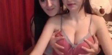 Lesbians Touching Breasts