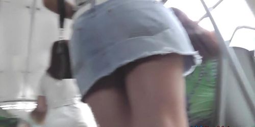 Mini skirt can't hide cool ass in upskirt thong video