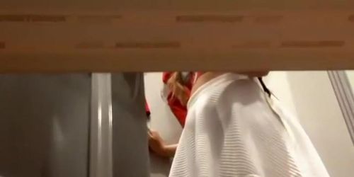 Spying on her tight ass in a trying booth