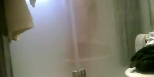 Nude body of amateur spied through shower curtains